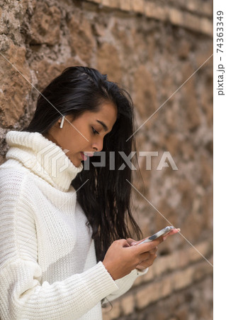 Choosing music from smartphone Choosing music from smartphone 74363349