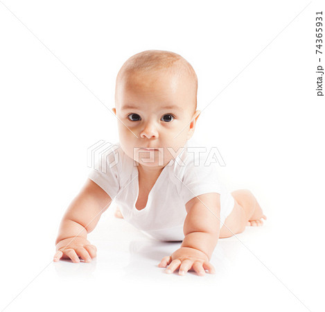 Cute baby boy is learning to craw, isolated Cute baby boy is learning to craw, isolated 74365931