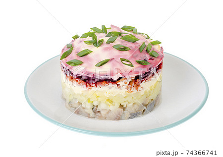 Portion puff vegetable salad with mayonnaise on white plate Portion puff vegetable salad with mayonnaise on white plate 74366741