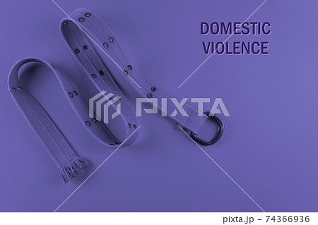 Belt and phrase Domestic Violence. Purple toned.  74366936