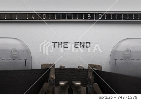 Typing text on typewriter Typing text on typewriter 74371579