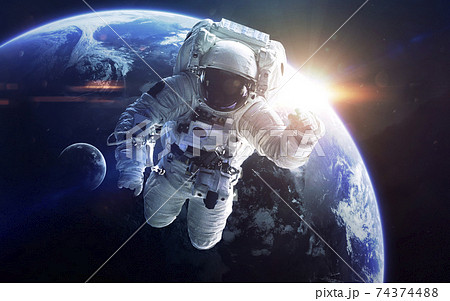 Little blue planet Earth in deep space. Elements of this image furnished by NASA Little blue planet Earth in deep space. Elements of this image furnished by NASA 74374488