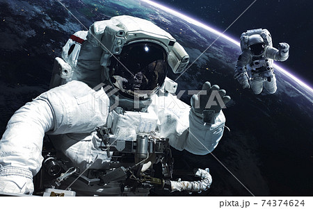 Astronaut. Abstract space wallpaper. Universe filled with stars, nebulas, galaxies and planets. Elements of this image furnished by NASA Astronaut. Abstract space wallpaper. Universe filled with stars, nebulas, galaxies and planets. Elements of this image furnished by NASA 74374624