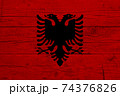 Flag of Albania. Wooden texture of the flag of Albania 74376826