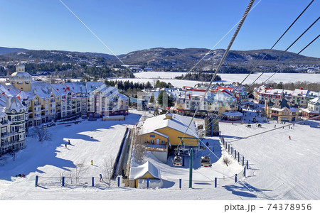 ont and Lake Tremblant village resort in winter, Quebec, Canada 74378956