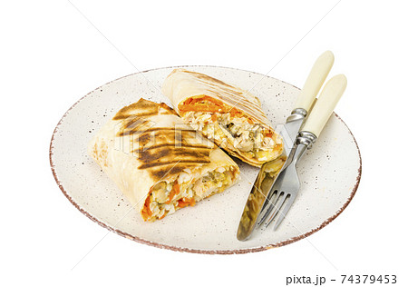 Shawarma, pita, tortilla with chicken and spicy carrots. Shawarma, pita, tortilla with chicken and spicy carrots. 74379453