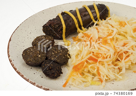 Black sausage with sauerkraut. Studio Photo Black sausage with sauerkraut. Studio Photo 74380169