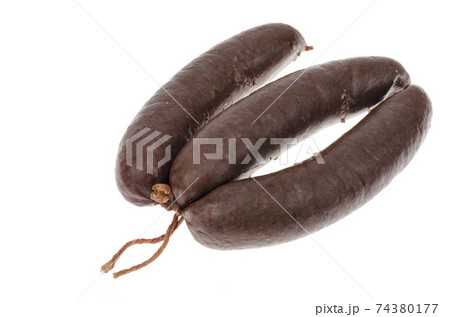 Black pudding isolated on white background. Photo 74380177