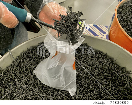Concept of construction and repair. Black wood screws Concept of construction and repair. Black wood screws 74380396