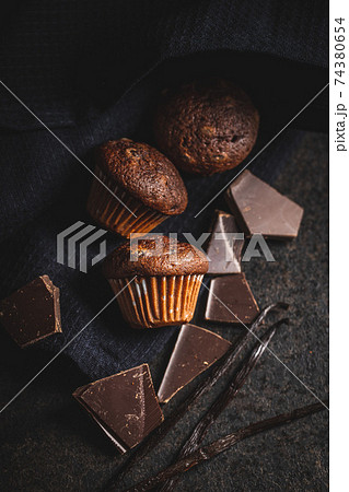 Chocolate muffins. Sweet dark cupcakes. Chocolate muffins. Sweet dark cupcakes. 74380654