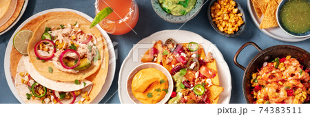 Mexican food, a panoramic banner on a blue background Mexican food, a panoramic banner on a blue background 74383511