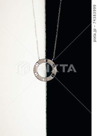 Tender jewerly for female neck, close up shot 74383999