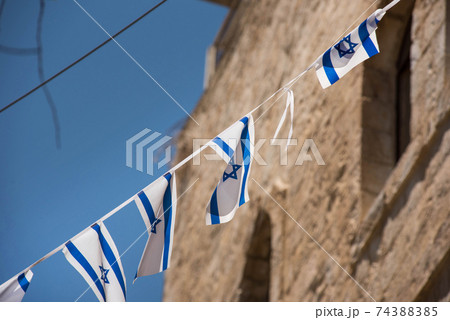 Israeli flag blowing in the wind 74388385