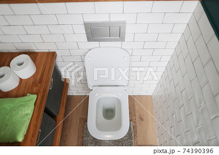 Bathroom with toilet and washbasin. Basic requirements for public restrooms Bathroom with toilet and washbasin. Basic requirements for public restrooms 74390396