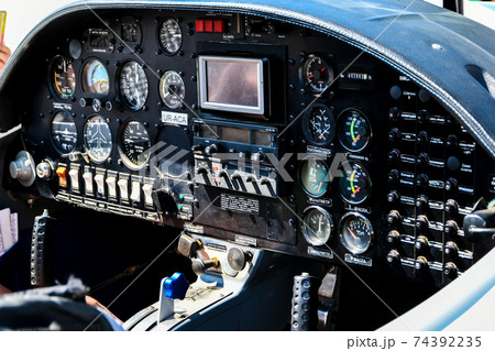 cockpit of an airplane. inside a airplane cockpit, little airplanes cockpit, pilot's view, airplane background cockpit of an airplane. inside a airplane cockpit, little airplanes cockpit, pilot's view, airplane background 74392235