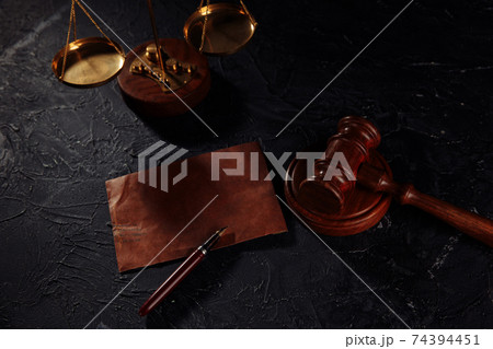 Notary public tools. Law concept with scales, pen, envelope and gavel 74394451