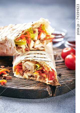 Eastern traditional shawarma with sauces Eastern traditional shawarma with sauces 74394923