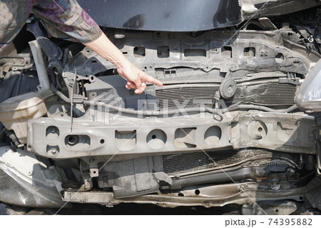 crashed damaged broken car. automobile crash accident 74395882