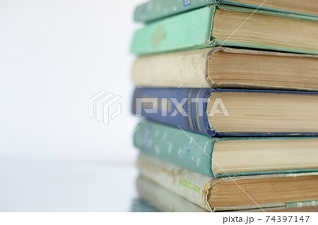Stacked old books Stacked old books 74397147