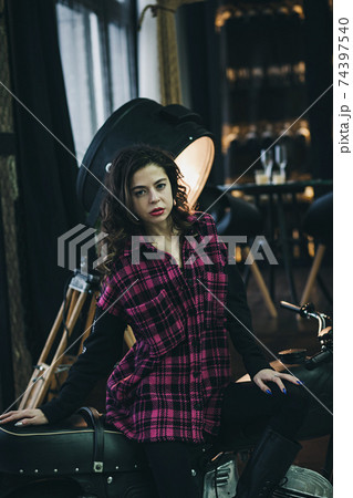 Beautiful motorcycle brunette woman Beautiful motorcycle brunette woman 74397540