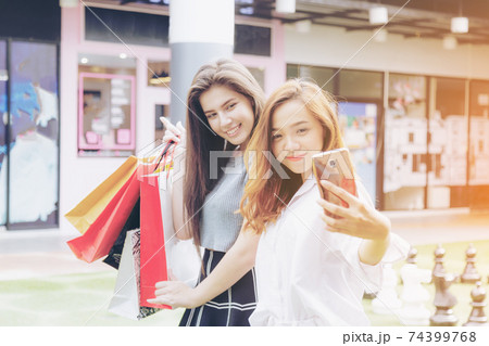 Girl and friend selfie Girl and friend selfie 74399768