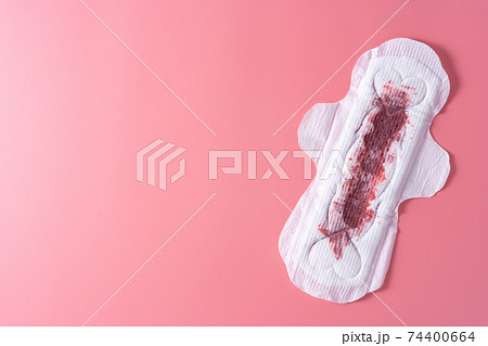 Used Sanitary Pad On Pink Background, Space For Text Stock Photo