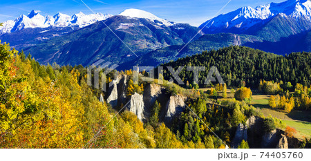 Impressive Italian Alps in Valle d'Aosta in golden autmn colors Impressive Italian Alps in Valle d'Aosta in golden autmn colors 74405760