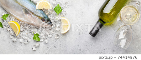 Raw fish cooking. Seafood and wine 74414876
