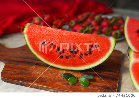 Red fresh watermelon on the wood Red fresh watermelon on the wood 74421006