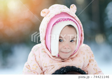 Winter portrait of kid with running nose Winter portrait of kid with running nose 74421146