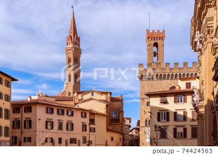 Medieval square (Piazza di San Firenze) with bell towers in the historical centre of Florence, Italy 74424563