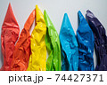Rainbow colors in Pastry bags on White Surface 74427371