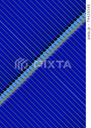 Pattern of dark blue pencils. 74429148