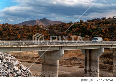 Beautiful autumn landscape in Turkey with car and bridge Beautiful autumn landscape in Turkey with car and bridge 74429258