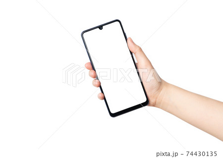 Close up of female hands holding mobile smart phone with white blank screen isolated on white background. Mock up. Copy space. Close up of female hands holding mobile smart phone with white blank screen isolated on white background. Mock up. Copy space. 74430135