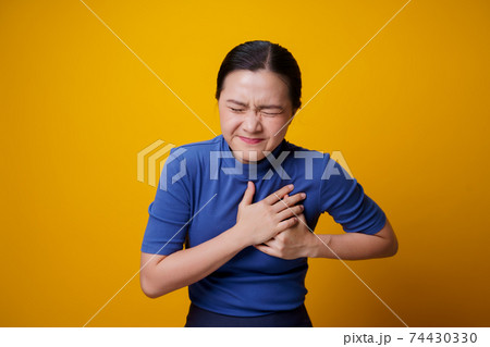 Asian woman was sick with chest pain. Asian woman was sick with chest pain. 74430330