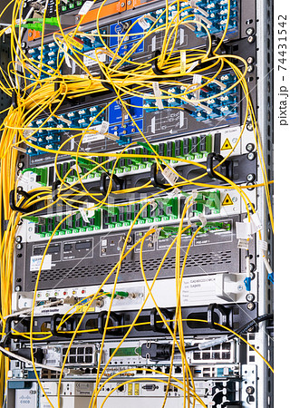 optical cables connected to internet service provider switch 74431542