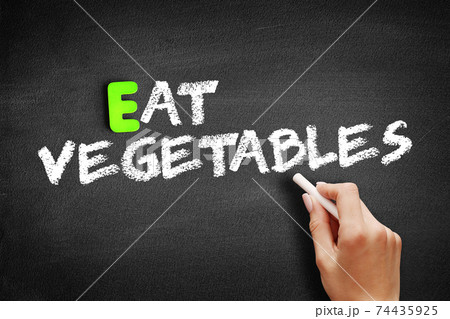 Hand writing Eat Vegetables on blackboard, concept background 74435925
