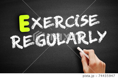 Hand writing Exercise Regularly on blackboard, concept background. 74435947