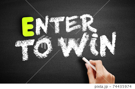 Hand writing Enter to Win on blackboard, business concept Hand writing Enter to Win on blackboard, business concept 74435974