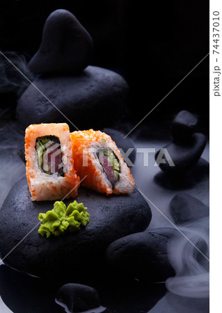 Close up of .California Maki Sushi with set .Sushi.  Close up of .California Maki Sushi with set .Sushi.  74437010