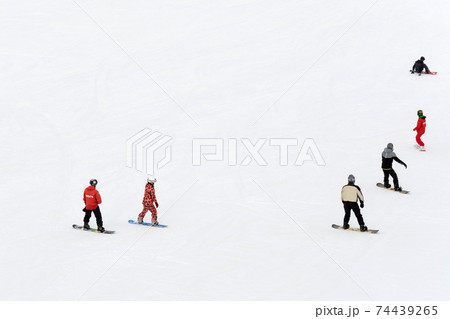 Bukovel, Ukraine February 3, 2019: skiing at the ski resort of Ukraine Bukovel, snow-covered ski slopes. Bukovel, Ukraine February 3, 2019: skiing at the ski resort of Ukraine Bukovel, snow-covered ski slopes. 74439265