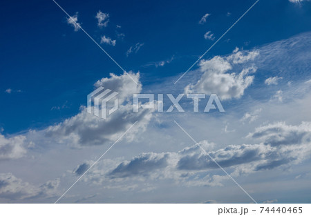White clouds with blue sky background White clouds with blue sky background 74440465