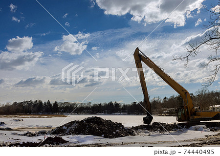 View from of the backhoe was digging a pit in the ground View from of the backhoe was digging a pit in the ground 74440495