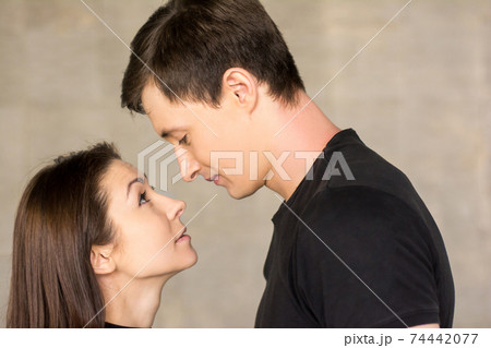 Portrait of couple looking at each other. Portrait of couple looking at each other. 74442077