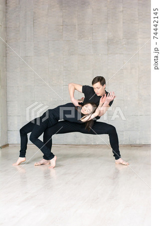 Couple of dancers in sensual movement. Couple of dancers in sensual movement. 74442145