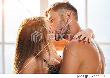 Young couple kissing. Young couple kissing. 74442246