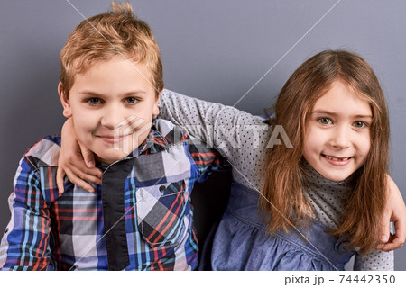 Young european brother and sister. 74442350
