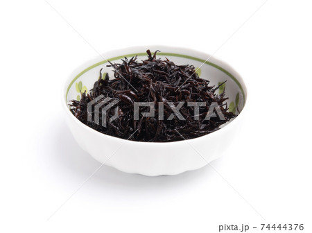 Hijiki seaweed in ceramic bowl isolated on white background. Japanese food Hijiki seaweed in ceramic bowl isolated on white background. Japanese food 74444376