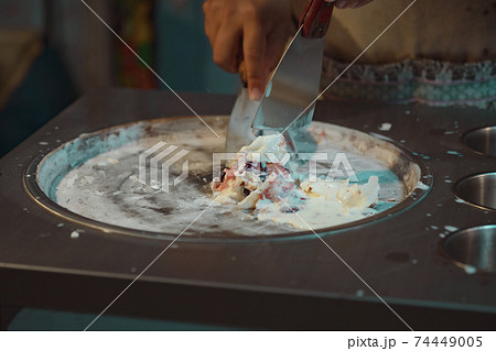 Process of making fried ice-cream dessert in night market. Thai famous gourmet street dessert food. Street food in Thailand. Process of making fried ice-cream dessert in night market. Thai famous gourmet street dessert food. Street food in Thailand. 74449005